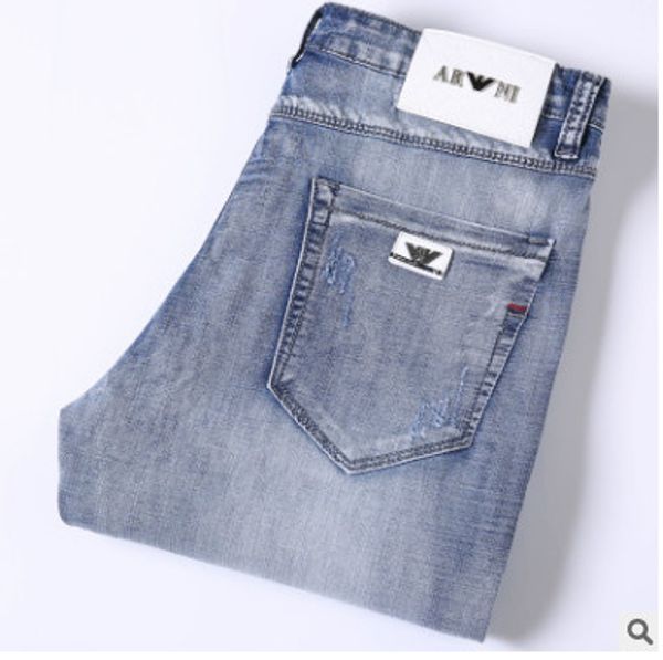 

2019 new arrival pring ummer new thin ela tic traight lim wa hed light blue 100 cotton men fa hion de igner jean