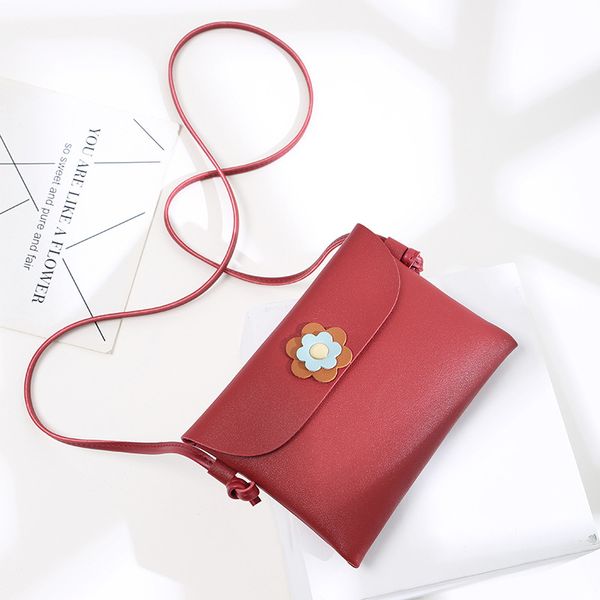 

2019 latest pu shoulder solid color hand delicate flower magnetic buckle fashion wild messenger bag
