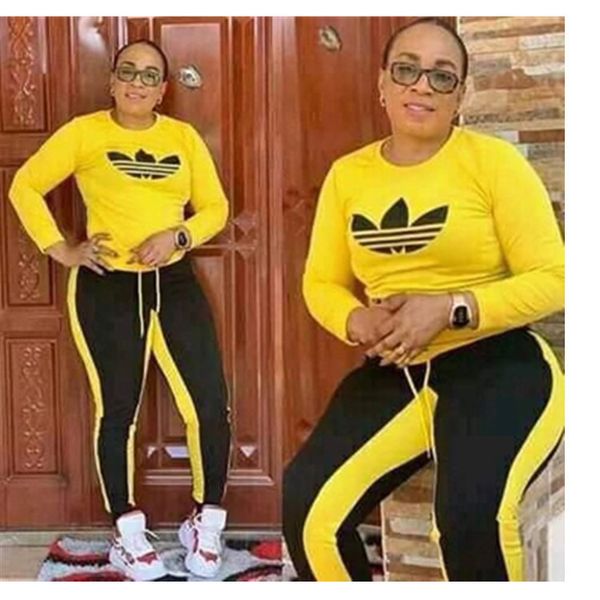 

Two piece large ize port wear women african europe and america color matching long leeved round neck port