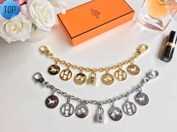 

H KEY HOLDERS CHARMS БОЛЬШЕ CHARM КЛЮЧЕВЫЕ ДЕРЖАТЕЛИ BAG CHARMS TAPAGE BAG TWIST BAG CHARM M68197