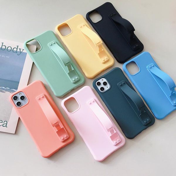 

matte candy wrist strap hand band silicone case for iphone 11 pro max xs max 6s 7 8 plus x xr phone stand ring protect cover newstore news