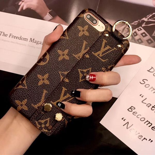 

Monogram leather wri tband bumper phone ca e for iphone x max xr x 8 7 6 plu wri t hand trap cellphone back cover bracket