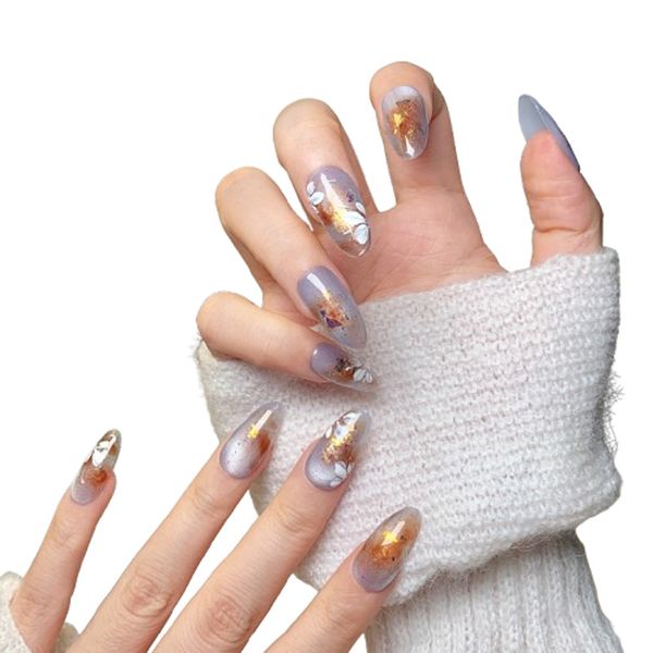 

Exquisite Handcrafted Artificial Nails Featuring Detailed Flowers & Cats' Eyes Patterns Ideal for Professional Boutiques