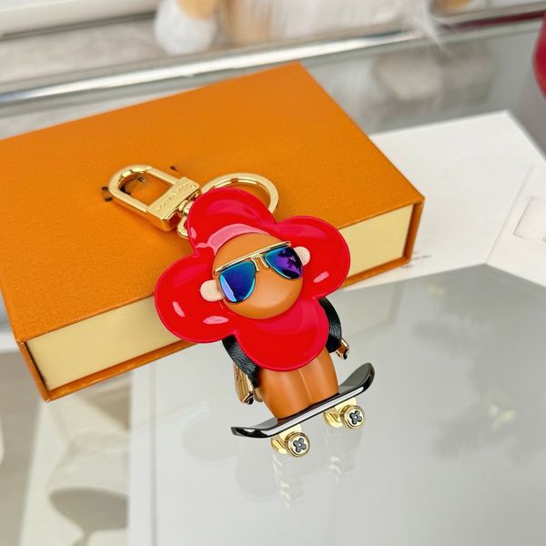 

Luxury designers keychains Letters keychain Cartoon Bag Charms Car Key Chain Women Buckle jewelry Keyring Bags Pendant Gift