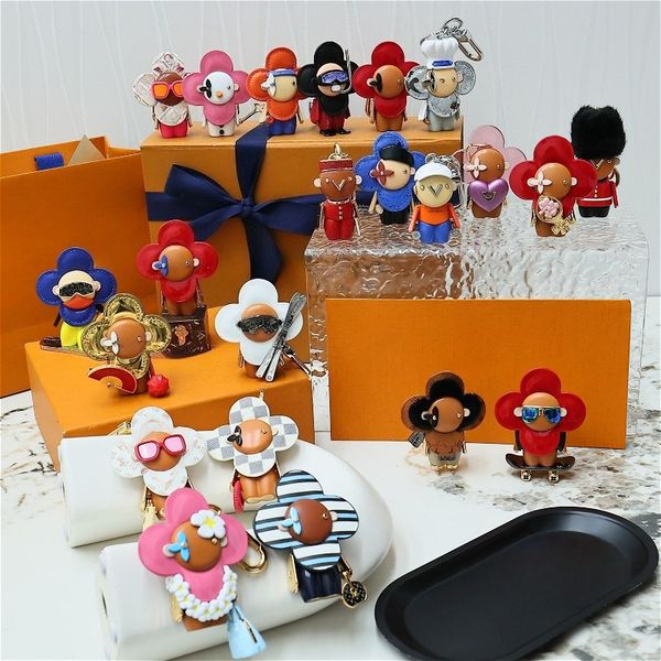 

Top Quality Luxury Stainless Steel Keychain Unisex Pendant Bag Charm Designer Sunflower Car Keychain with Logo Fashion Cute Couple Gift Bag Accessory