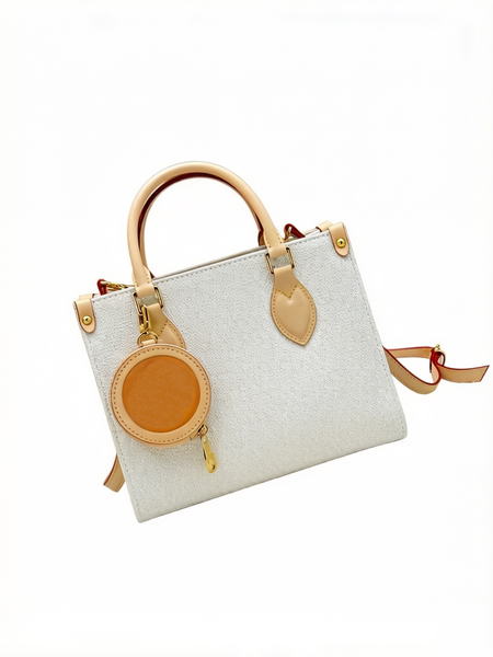 The handbag collection brightens various looks with elegant designs, featuring leather long shoulder straps for convenient crossbody wear.
