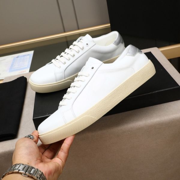 Highquality handmade white leather sports shoes with premium genuine leather upper featuring a classic minimalist style