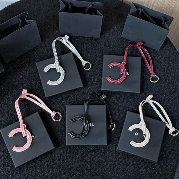 

Genuine Leather Bag Charm Designer Keychain Luxury Letter Keyring for Men Women Purse Charm Premium Hardware Key Fob Holiday Gift