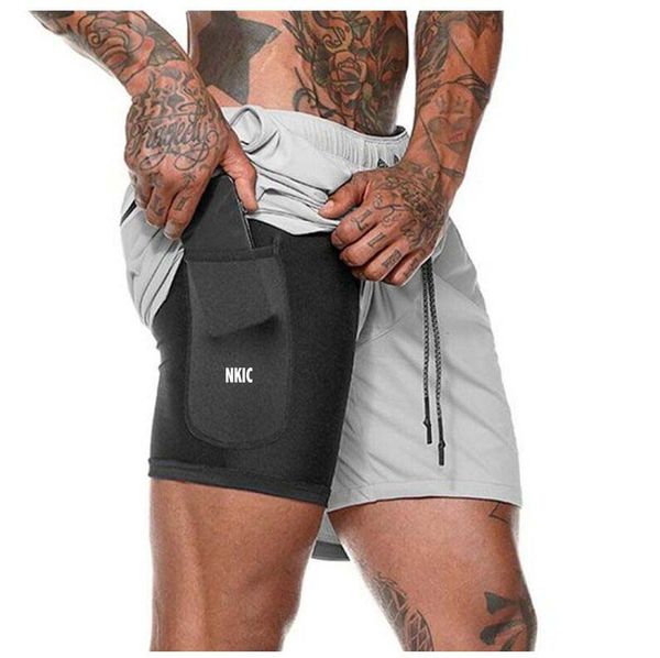

Summer Gyms Workout Male Breathable Mesh Quick Dry Sportswear Jogger Beach Solid Shorts Men Fitness Bodybuilding Brand Shorts Plus Size 3XL, Black 1