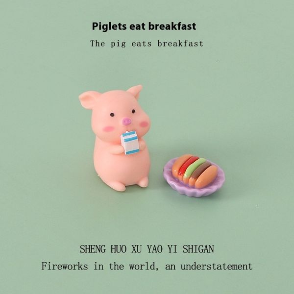 

Whimsical Animal-Shaped Desk Sculptures - Adorable Mini Pig Collectibles