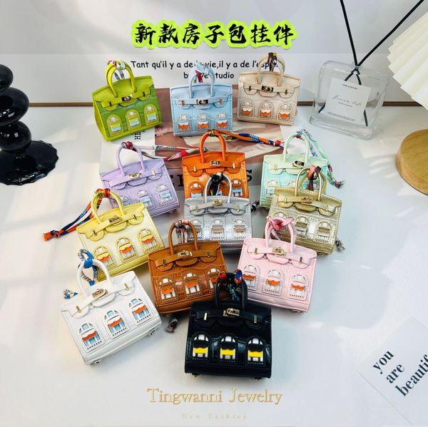 

New fashionable mini bag hanger, cute small house shaped, multi-purpose for lipstick, earphone, car key bag.