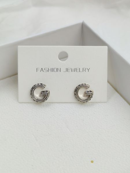 

Designer earring premium sense zirconium full diamond S925 silver pin earrings female classic versatile temperament niche design double G earrings