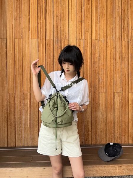 

New multi-functional single shoulder backpack leisure simple men and women with large capacity lightweight crossbody bucket bag wholesale, Orange