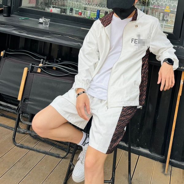 

"Stylish and Functional Spring/Summer Hooded Sun Protection Suit with Dark Pattern Print and Color Splicing - Perfect for Leisure and Outdoor Activities", White