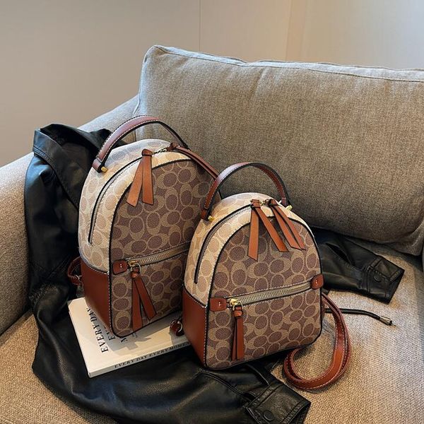 

Factory sales women shoulder bag 3 colors simple color matching leather leisure backpack Joker polka dot fashion handbag printed student backpacks 2320#, Brown