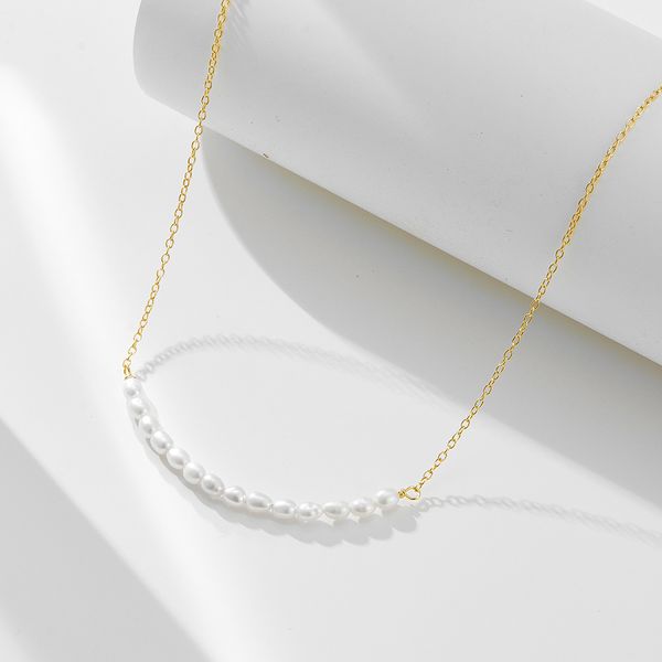 

S925 pure silver smiling face natural pearl necklace for women in Europe and America, simple and versatile, freshwater rice bead pendant, collarbone chain