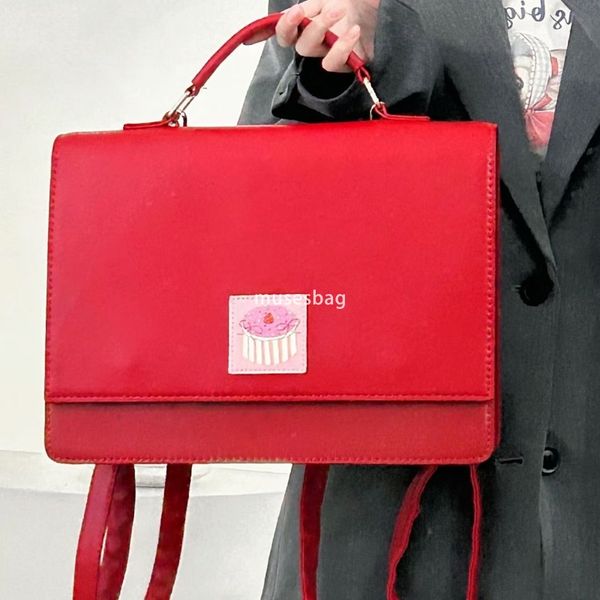 

Designer Ms Atmosphere Academy Style Retro Red Large Capacity Backpack Small and Multi functional Handheld Diagonal Straddle Bag Student Commuting Backpack