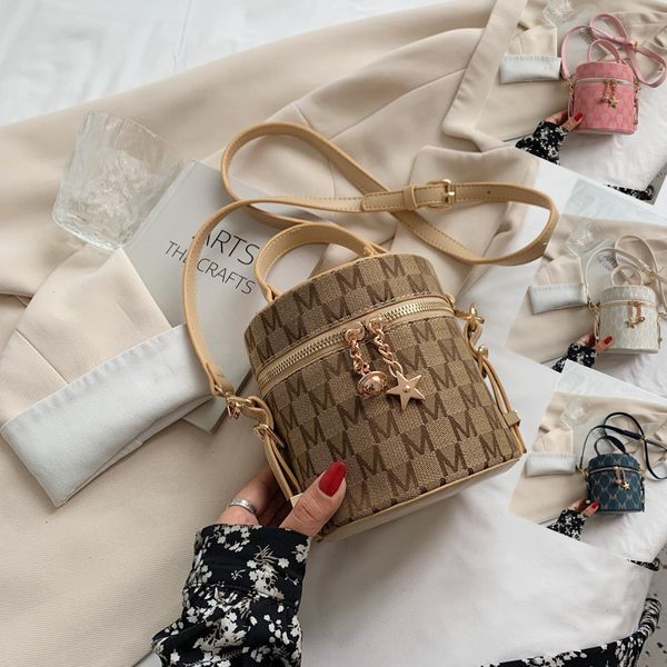 

Factory wholesale women handbag summer sweet cute cartoon pendants fashion bucket bag Western style cylinder printed handbag womens backpack 12901#, Welfare color/regular packaging