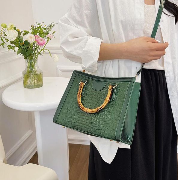 

Wholesale factory ladies shoulder bags 6 colors street fashion crocodile handbag elegant solid color leather tote bag Joker embossed black fashion backpack 5050#