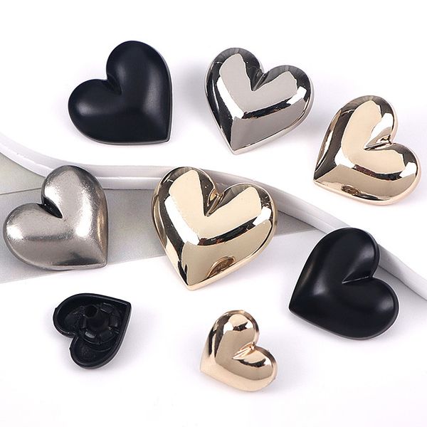 

Elegant Female Fashion Details: Golden Heart Buttons Featuring Natural Plastic Pearls