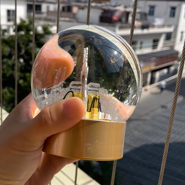 

Designer Christmas Snow Globe With Perfume Bottle Inside Crystal Ball for Special Birthday Novelty VIP Gift