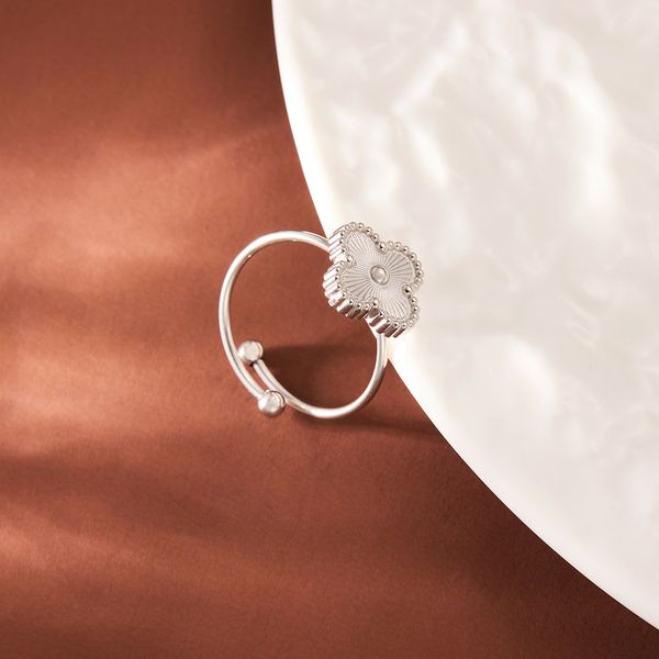 

Titanium steel four-leaf clover open ring Korean version couple simple ring 18k gold color non-fading titanium steel hand