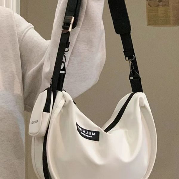 

Japanese casual dumplings, sports style crossbody bag, women's large capacity canvas bag, student class one shoulder commuting bag, trendy, Black