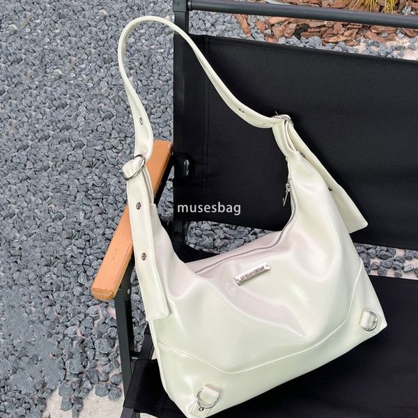 

A niche women designer bag with advanced minimalist and multifunctional texture tote bag for commuting large capacity bag soft leather one shoulder crossbody bag, White