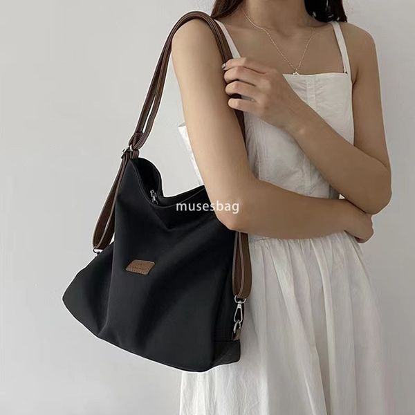 

Street trend niche design spring and summer new canvas tote bag multifunctional single shoulder crossbody bag popular contrasting color women bag, White