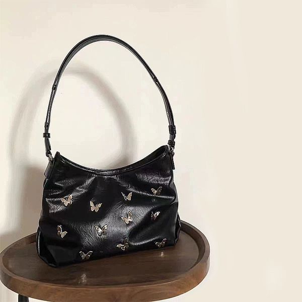 

A niche spicy and cool three-dimensional butterfly bag with a new fashionable metal texture handbag light luxury commuting underarm bag, Black