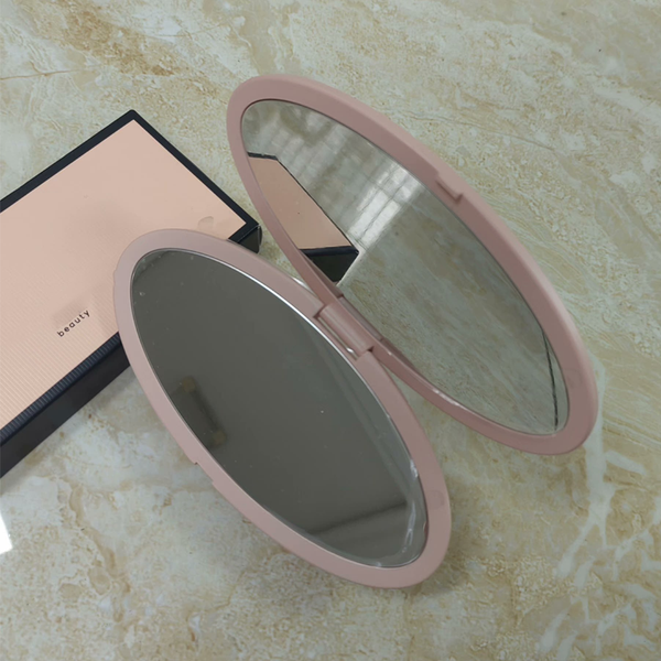 

Compact Oval Foldable Double-Sided Travel Mirror for Girls & Women - Pink