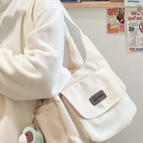 

Street trend college style student commuting bag, Japanese Instagram style retro commuting tote bag women's new niche design simple and casual canvas bag, White