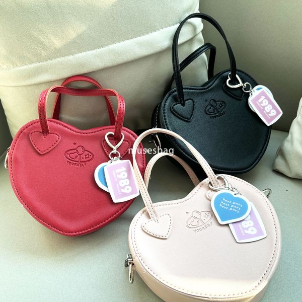 

New street trend niche design with cheese and milk candy homemade sweet girl crossbody bag playful peach heart handbag mini heart shaped bag, Pink