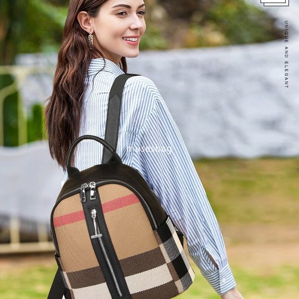 

European and American retro niche design top layer leather contrasting canvas backpack new fashionable Korean version backpack commuting student bag, Black