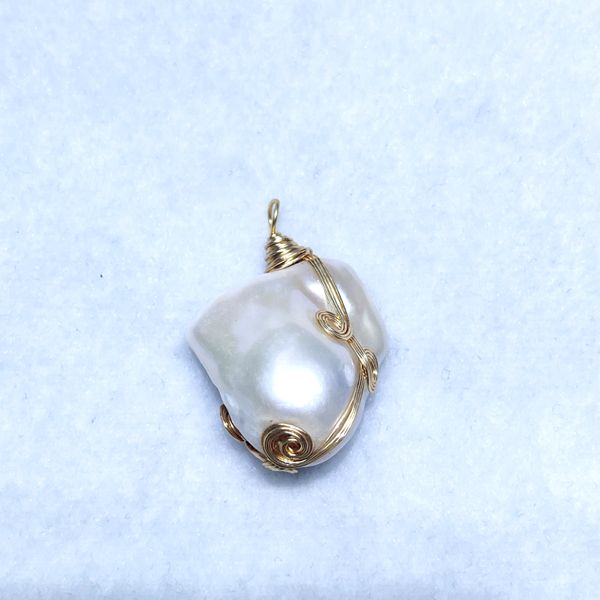 

Classic & Contemporary Baroque Pearl Accessory Collection Featuring Unique Pendants