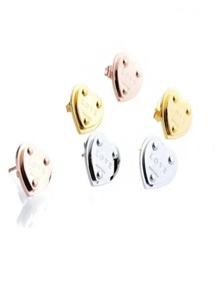 

europe america simple style lady women titanium steel engraved t initials heart rivets stud earrings 3 color7338882, Golden;silver