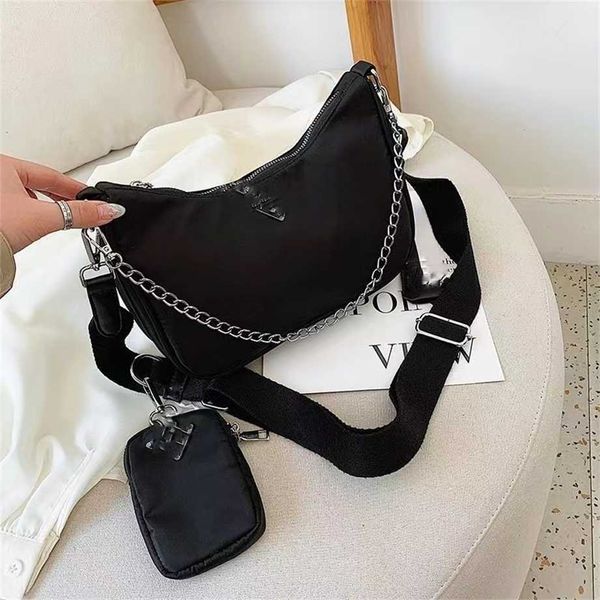 

2023 family women's triangle label nylon waterproof three in one chain underarm single back crossbody bag off wholesale