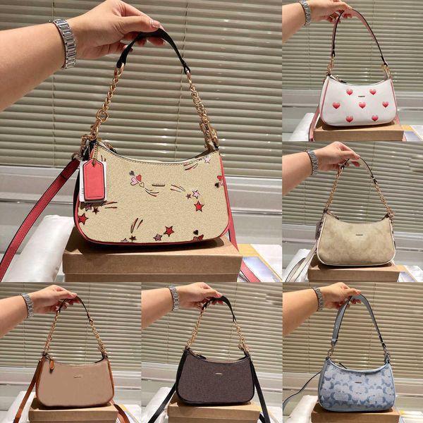 

designer bag purse luxury bag women shoulder bags vintage leather handbags elegant star heart print underarm crossbody bags 230717