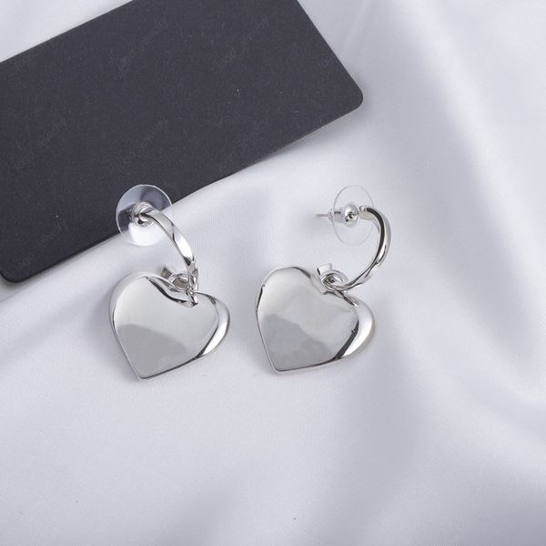 

designer jewelry, silver heart-shaped earrings, high fashion charm women's accessories, weddings, banquets, balls, christmas, gifts, Golden