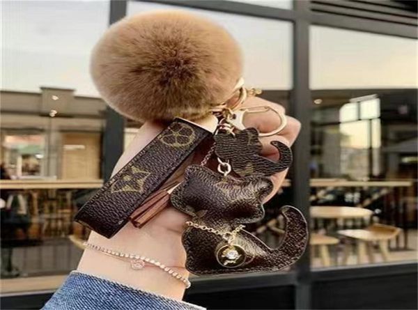 

leather key chain male and female gifts bag car keyring doll pendant style 19 color with box whole8028167, Red;blue