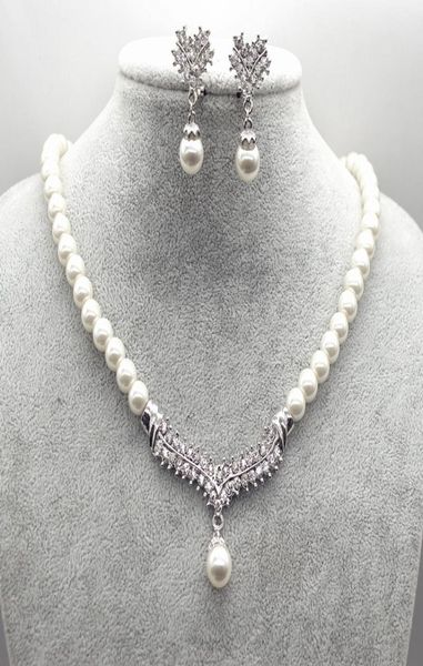 

white gold plated cream faux glass pearl and rhinestone crystal wedding necklace and earrings jewelry sets9750818, Silver