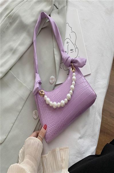 

women039s luxurys bagsunderarm minority luxurys sfeeling 2021 new versatile pearl portable popular one shoulder french stick ba9134608