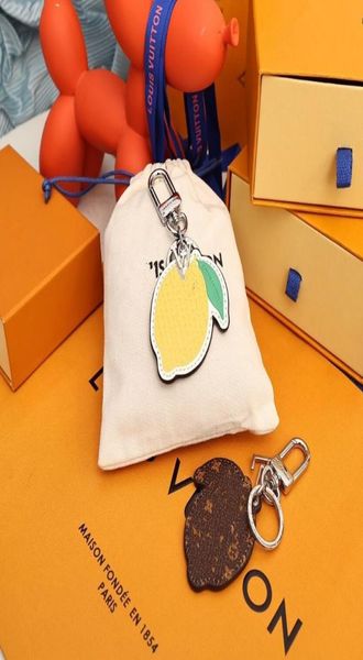 

designer embossed letter key wallet luxury brand lemon keychain silver metal letters shoulder bag crossbody totes women men7488580, Red;blue