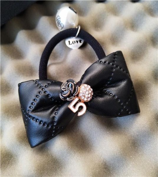 

simple pearl hair rope hair ring bowknot head rope retro pendant leather bar korean hair ornaments counter gifts8179700, Pink