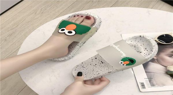 

xingang wind joint sesame street slippers women summer wear beach drag flat lazy drag chic cartoon tide6545529, Black