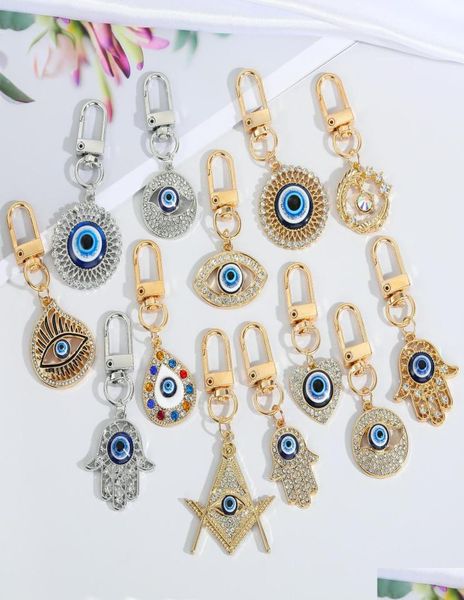 

keychains lanyards 13 styles creative devil eye rhinestone keychain for men women blue evil eyes car key ring bag pendant jewelry 3739379, Silver