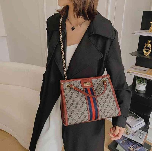 

80 off french niche chain bag women039s new classic printed tote bag versatile one shoulder diagonal cross contrast handbags2149682