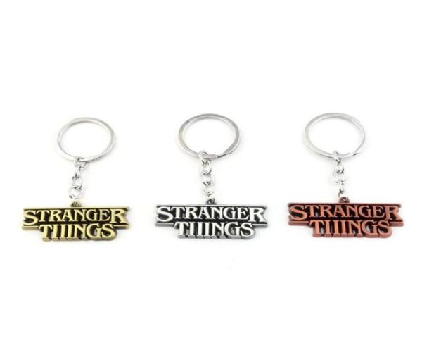 

moq10pcs horror tv series stranger things letter logo keychains 3 colors letter pendant car key chain for men jewelry souvenir gi7503170, Silver