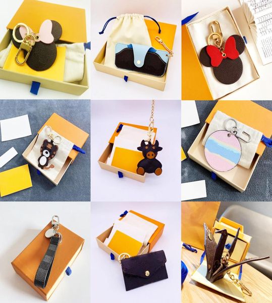 

22ss design without box letter print cartoon brand designer keychain holder pu leather animal car keyrings key chain high qualtiy 6064654, Silver