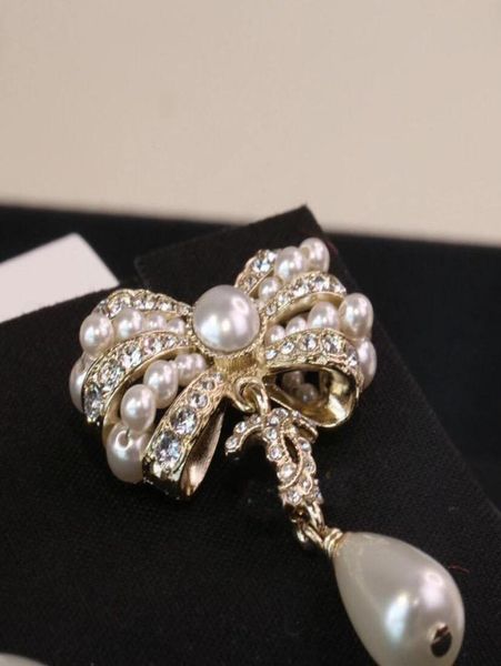 

stud earring with diamond and white pearl for women wedding jewelry gift have box knot shape ps32193792053, Golden